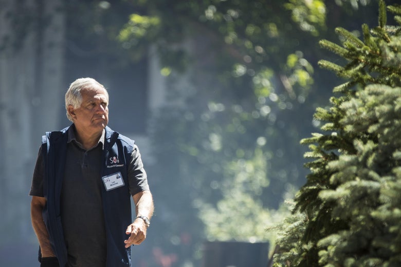 Les Moonves in a blue vest, looking unhappy.